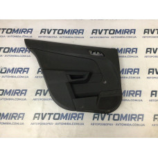 Обшивка двери левой задней Опель Астра Opel Astra H (2007-2010) 13167260