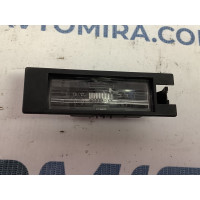 Фонарь подсветки номера Опель Астра Opel Astra H (2007-2010) 13139990